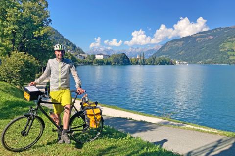 Cyclist in front of Lake Zell