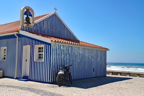 Blue fisherman's chapel at the sea