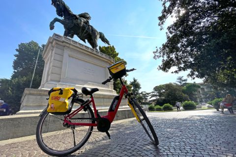 Eurobike e-bike rental in front of equestrian statue