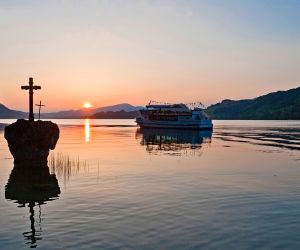 Sunset and ship on Lake Mondsee