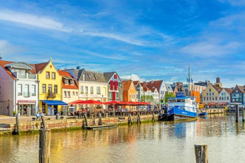Colourful row of houses in Husum harbour