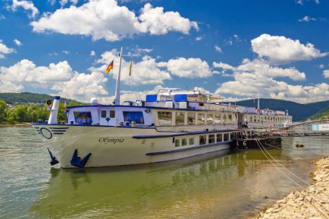 MS Olmpia at a pier on the Rhine River