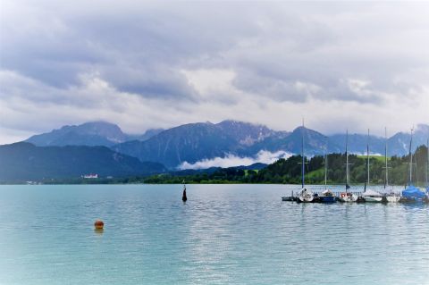 Forggensee with mountains