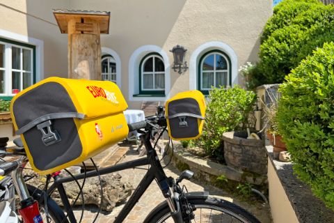 Eurobike rental bike PLUS with yellow handlebar bag