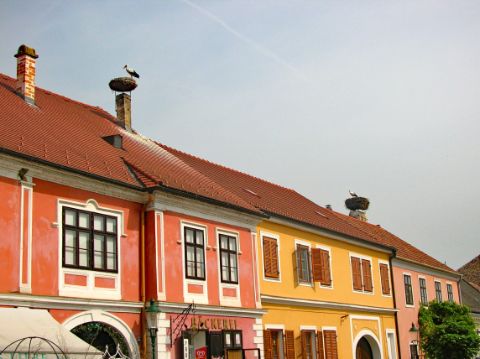 Colorful houses with stork on the roof top