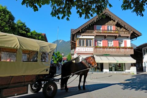 Horse-drawn carriage in the center of Garmisch Partenkirchen