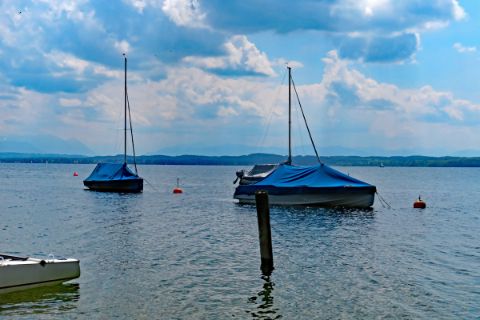 Covered sailboats lake Starnberg