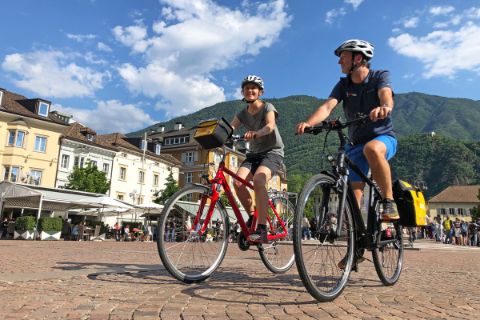 Cyclists in city centre of Bolzano