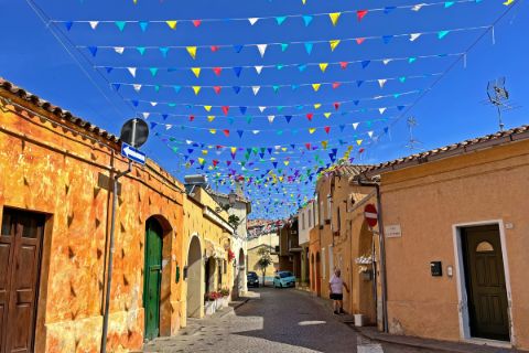 Colourfully decorated alley in Pula