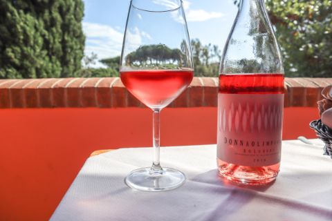 Rose wine with view of the Tuscan countryside