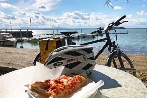 Bike break with pizza right on the beach