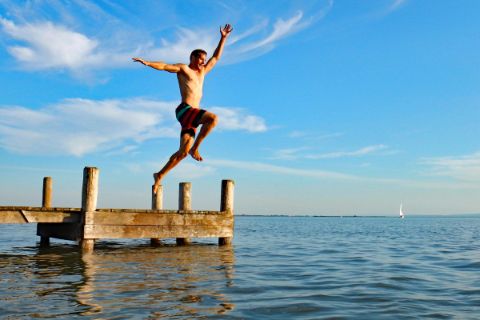 Man jumps in the Lake Neusiedl