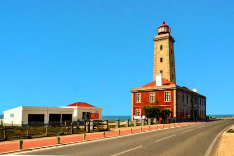 Lighthouse on the coastal road on the Atlantic Ocean