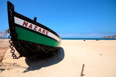 Fishing boat on the beach of Nazaré