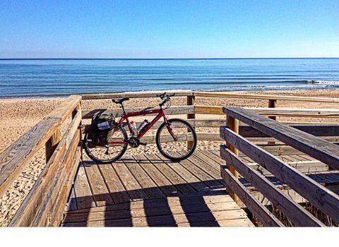 Bike in front of beach and sea
