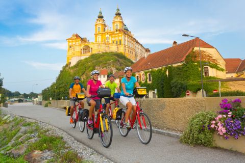 Cyclist in front of Melk Abbey 