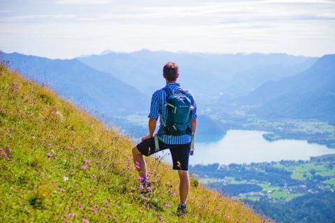 Hiker with a view of the landscape in the Salzkammergut