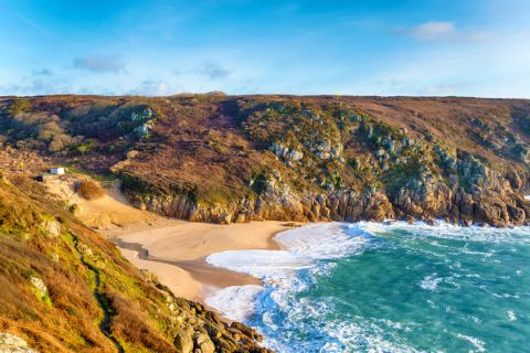 The beach of Porthcurno at sunset