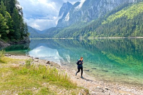 Hiker on the shore of the Gosausee