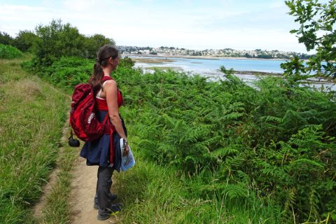 Hiker enjoy the beautiful view from the coastal path