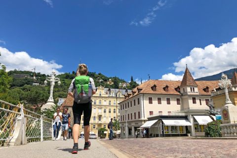 Hikers explore the cure town Meran