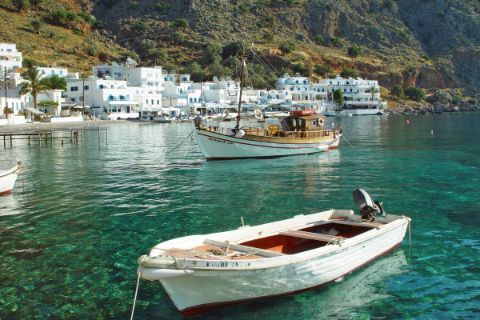 Crystal-clear water in the port of Loutro