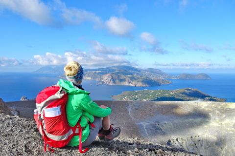 Hiking break with seaview from the edge of the volcanic crater of Vulcano
