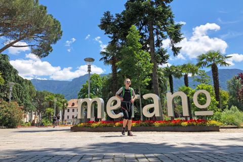 Hiker explores the romantic town of Merano