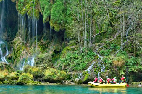 Boat tour through the green woods of Montenegro